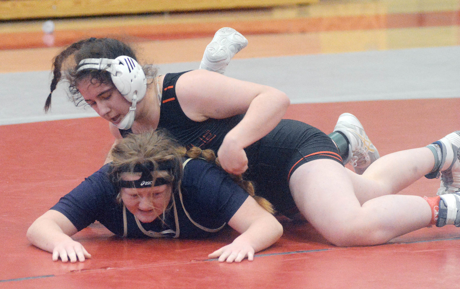 Kelby Schoenfeld (behind) breaks down St. Pius X’s (Festus) Sophie Meyer during their third-place match at 190 pounds. Dare went on to win a district title while Schoenfeld placed third at 190 pounds to qualify for the 2023 MSHSAA Wrestling Championships next week in Columbia.